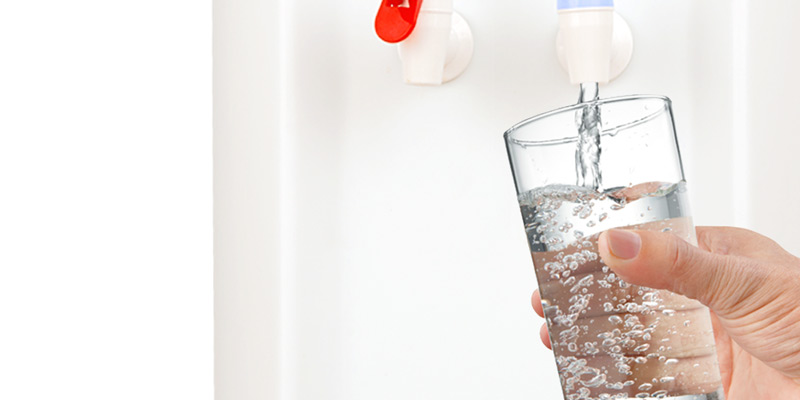 Filling glass of water from XO bottleless cooler